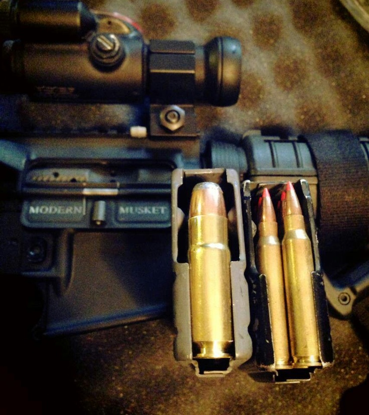 .458 SOCOM with a 400 grain bullet on the left versus a .223 V-Max with a 50 grain projectile on the right. 